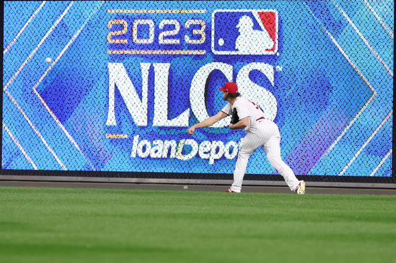 Oct 17, 2023; Philadelphia, Pennsylvania, USA; Philadelphia Phillies starting pitcher Aaron Nola (27) warms up before game two of the NLCS for the 2023 MLB playoffs Arizona Diamondbacks at Citizens Bank Park. Mandatory Credit: Bill Streicher-USA TODAY Sports