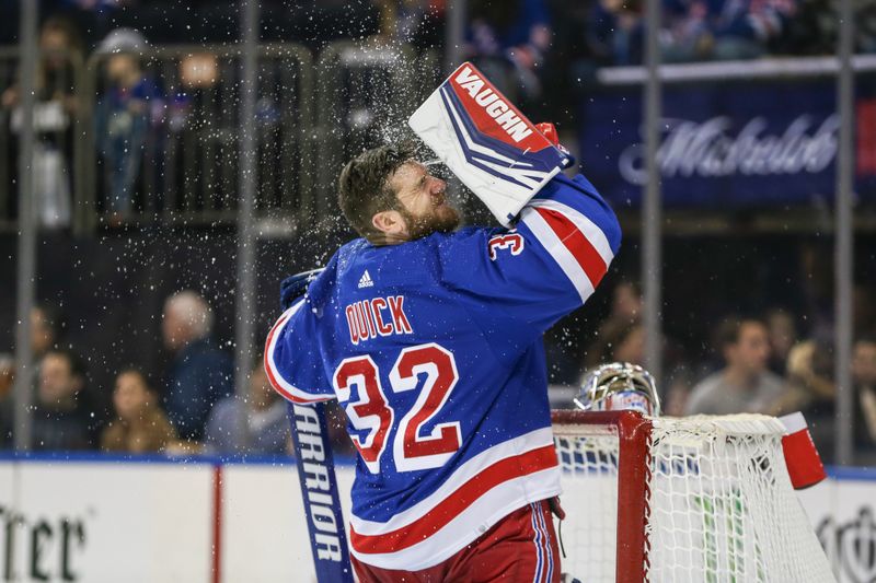 Dec 3, 2023; New York, New York, USA;  New York Rangers goaltender Jonathan Quick (32) splashes water on his face prior to the start of the game against the San Jose Sharks at Madison Square Garden. Mandatory Credit: Wendell Cruz-USA TODAY Sports