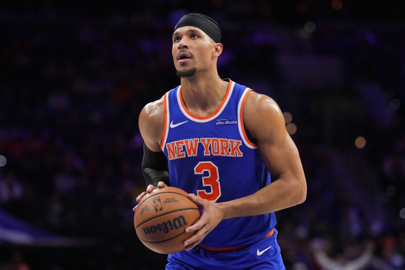 PHILADELPHIA, PA - JANUARY 15: Josh Hart #3 of the New York Knicks shoots a free throw during the game against the Philadelphia 76ers on January 15, 2025 at the Wells Fargo Center in Philadelphia, Pennsylvania NOTE TO USER: User expressly acknowledges and agrees that, by downloading and/or using this Photograph, user is consenting to the terms and conditions of the Getty Images License Agreement. Mandatory Copyright Notice: Copyright 2025 NBAE (Photo by Jesse D. Garrabrant/NBAE via Getty Images)