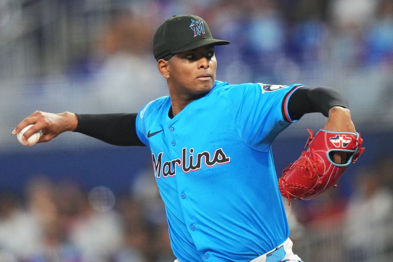 Jul 7, 2024; Miami, Florida, USA;  Miami Marlins starting pitcher Edward Cabrera (27) pitches against the Chicago White Sox at loanDepot Park. Mandatory Credit: Jim Rassol-USA TODAY Sports