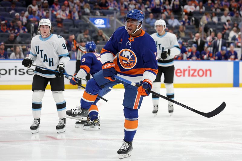 Oct 10, 2024; Elmont, New York, USA; New York Islanders left wing Anthony Duclair (11) reacts during the second period against the Utah Hockey Club at UBS Arena. Mandatory Credit: Brad Penner-Imagn Images