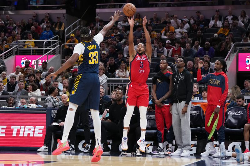 INDIANAPOLIS, INDIANA - NOVEMBER 25: CJ McCollum #3 of the New Orleans Pelicans attempts a shot while being guarded by Myles Turner #33 of the Indiana Pacers in the third quarter at Gainbridge Fieldhouse on November 25, 2024 in Indianapolis, Indiana. NOTE TO USER: User expressly acknowledges and agrees that, by downloading and or using this photograph, User is consenting to the terms and conditions of the Getty Images License Agreement. (Photo by Dylan Buell/Getty Images)