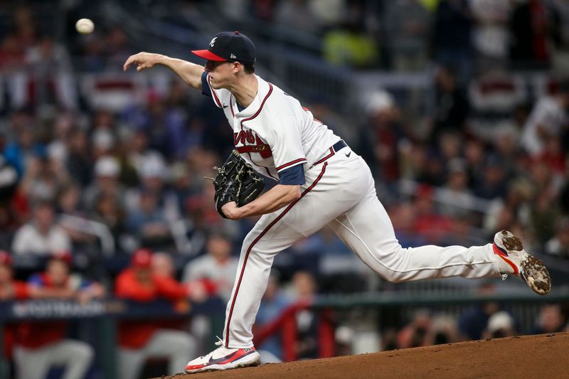 Oct 12, 2022; Atlanta, Georgia, USA; Atlanta Braves starting pitcher Kyle Wright (30) throws against the Philadelphia Phillies in the first inning during game two of the NLDS for the 2022 MLB Playoffs at Truist Park. Mandatory Credit: Brett Davis-USA TODAY Sports