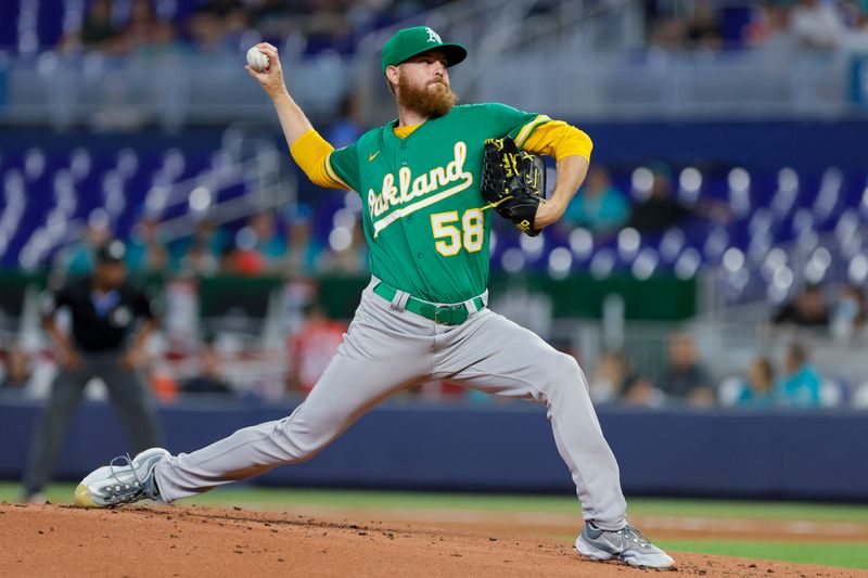 Jun 4, 2023; Miami, Florida, USA; Oakland Athletics starting pitcher Paul Blackburn (58) delivers a pitch against the Miami Marlins during the first inning at loanDepot Park. Mandatory Credit: Sam Navarro-USA TODAY Sports