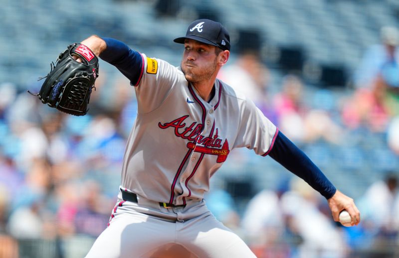 Jul 30, 2025; Kansas City, Missouri, USA; Atlanta Braves starting pitcher Joey Wentz (33) pitches during the first inning against the Kansas City Royals at Kauffman Stadium. Mandatory Credit: Jay Biggerstaff-Imagn Images