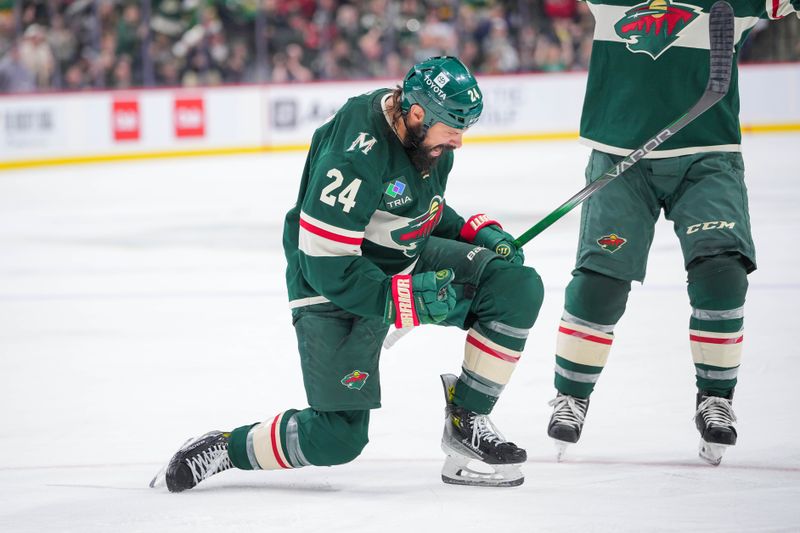 Nov 5, 2024; Saint Paul, Minnesota, USA; Minnesota Wild defenseman Zach Bogosian (24) celebrates his goal against the Los Angeles Kings in the second period at Xcel Energy Center. Mandatory Credit: Brad Rempel-Imagn Images