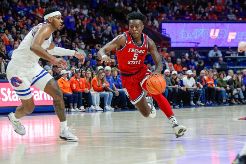 Feb 17, 2024; Boise, Idaho, USA; Fresno State Bulldogs guard Jalen Weaver (5) during the first half against the Boise State Broncos at ExtraMile Arena. Mandatory Credit: Brian Losness-USA TODAY Sports
