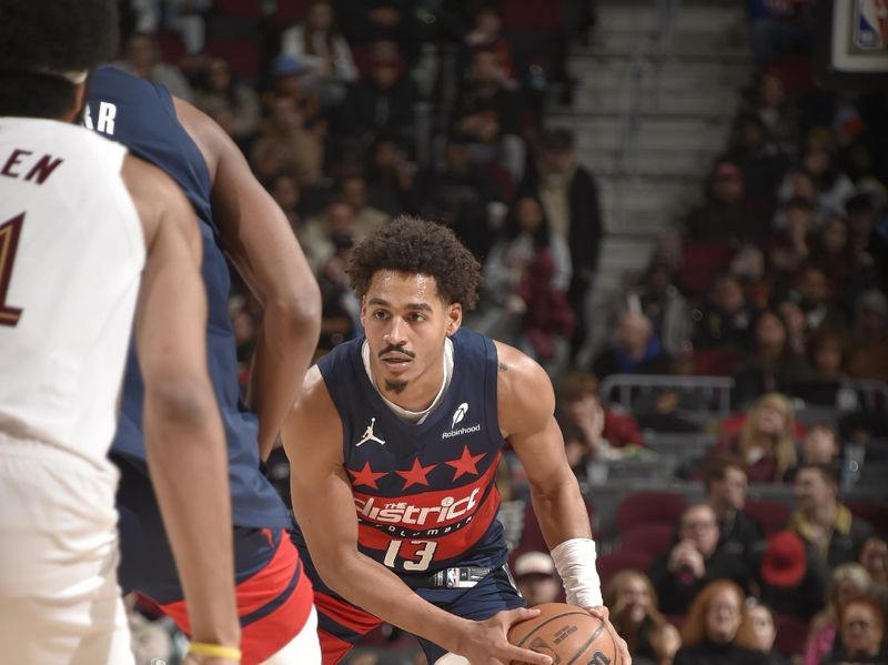 CLEVELAND, OH - DECEMBER 13: Jordan Poole #13 of the Washington Wizards handles the ball during the game against the Cleveland Cavaliers on December 13, 2024 at Rocket Mortgage FieldHouse in Cleveland, Ohio. NOTE TO USER: User expressly acknowledges and agrees that, by downloading and/or using this Photograph, user is consenting to the terms and conditions of the Getty Images License Agreement. Mandatory Copyright Notice: Copyright 2024 NBAE (Photo by David Liam Kyle/NBAE via Getty Images)