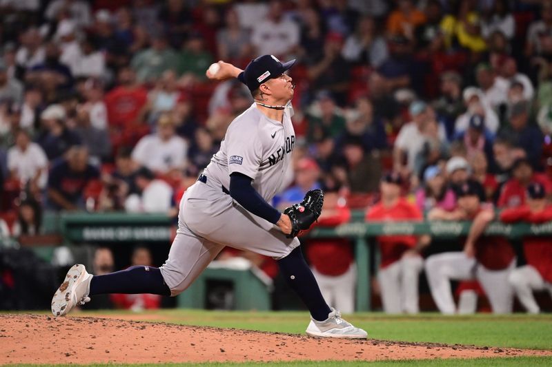 Jun 14, 2024; Boston, Massachusetts, USA; New York Yankees pitcher Victor Gonzalez (47) pitches against the Boston Red Sox during the eighth inning at Fenway Park. Mandatory Credit: Eric Canha-USA TODAY Sports