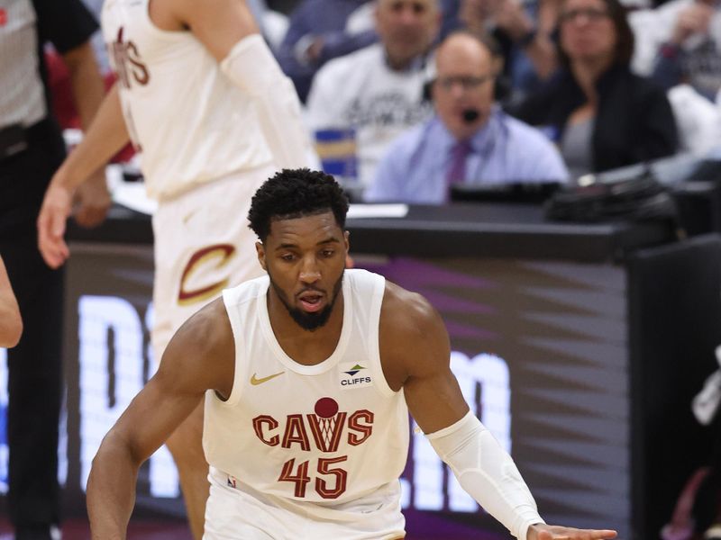 CLEVELAND, OH - APRIL 22: Donovan Mitchell #45 of the Cleveland Cavaliers dribbles the ball during the game against the Orlando Magic during Round 1 Game 2 of the 2024 NBA Playoffs on April 22, 2024 at Rocket Mortgage FieldHouse in Cleveland, Ohio. NOTE TO USER: User expressly acknowledges and agrees that, by downloading and/or using this Photograph, user is consenting to the terms and conditions of the Getty Images License Agreement. Mandatory Copyright Notice: Copyright 2024 NBAE (Photo by Lauren Leigh Bacho/NBAE via Getty Images)