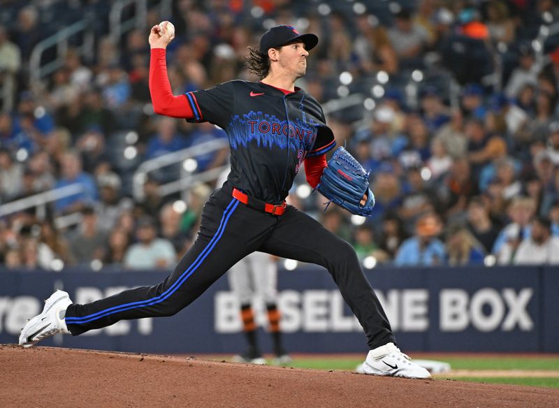 Aug 8, 2024; Toronto, Ontario, CAN; Toronto Blue Jays pitcher Kevin Gausman (34) pitches in the first inning against the Baltimore Orioles at Rogers Centre. Mandatory Credit: Gerry Angus-USA TODAY Sports