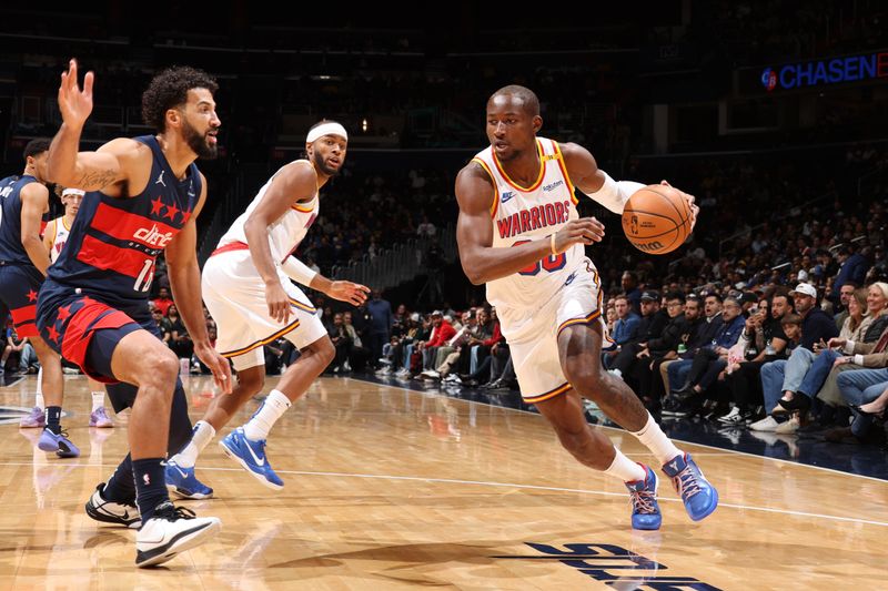 WASHINGTON, DC -? NOVEMBER 4: Jonathan Kuminga #00 of the Golden State Warriors drives to the basket during the game against the Washington Wizards on November 4, 2024 at Capital One Arena in Washington, DC. NOTE TO USER: User expressly acknowledges and agrees that, by downloading and or using this Photograph, user is consenting to the terms and conditions of the Getty Images License Agreement. Mandatory Copyright Notice: Copyright 2024 NBAE (Photo by Stephen Gosling/NBAE via Getty Images)