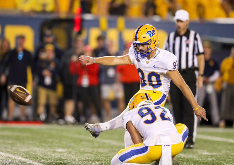 Sep 16, 2023; Morgantown, West Virginia, USA; Pittsburgh Panthers place kicker Ben Sauls (90) kicks a field goal during the first quarter against the West Virginia Mountaineers at Mountaineer Field at Milan Puskar Stadium. Mandatory Credit: Ben Queen-USA TODAY Sports