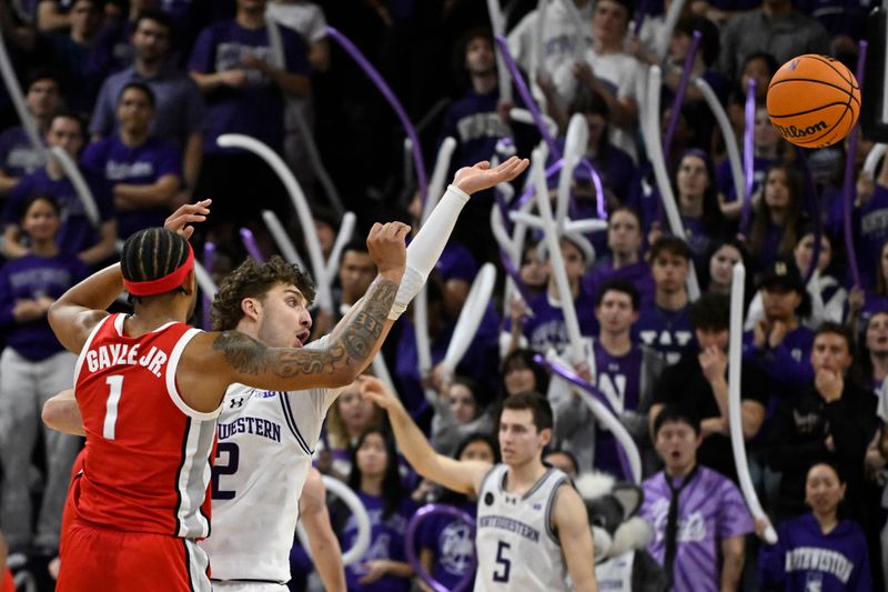 Jan 27, 2024; Evanston, Illinois, USA; Ohio State Buckeyes guard Roddy Gayle Jr. (1) passes the ball against Northwestern Wildcats forward Nick Martinelli (2)  the second half  at Welsh-Ryan Arena. Mandatory Credit: Matt Marton-USA TODAY Sports