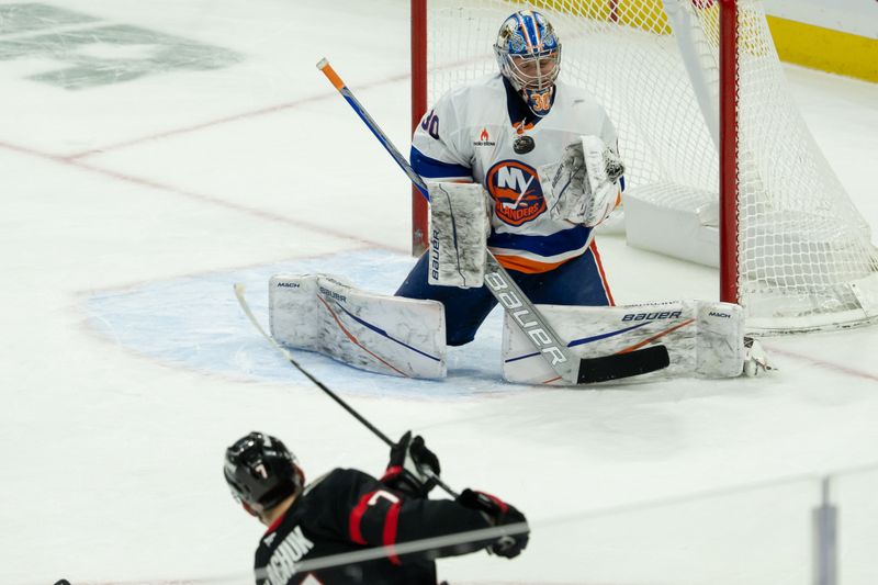 Dec 8, 2024; Ottawa, Ontario, CAN; New York Islanders goalie Ilya Sorokin (30) makes a save on a shot from Ottawa Senators left wing Brady Tkachuk (7) in the third period at the Canadian Tire Centre. Mandatory Credit: Marc DesRosiers-Imagn Images