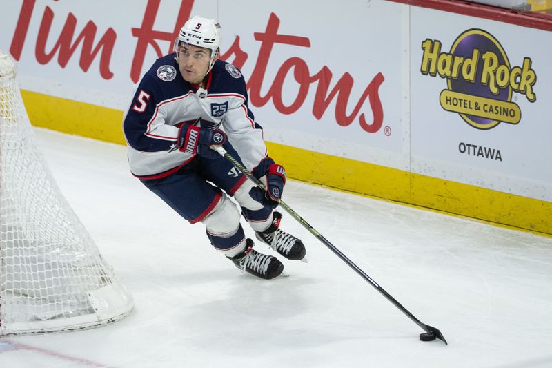 Dec 29, 2025; Ottawa, Ontario, CAN; Columbus Blue Jackets defenseman Denton Mateychuk (5) skates with the puck in the third period against the Ottawa Senators at the Canadian Tire Centre. Mandatory Credit: Marc DesRosiers-IMAGN Images
