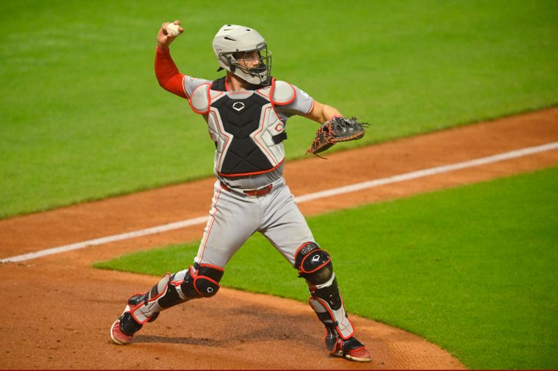 Sep 24, 2024; Cleveland, Ohio, USA; Cincinnati Reds catcher Tyler Stephenson (37) throws to first base in the fifth inning against the Cleveland Guardians at Progressive Field. Mandatory Credit: David Richard-Imagn Images