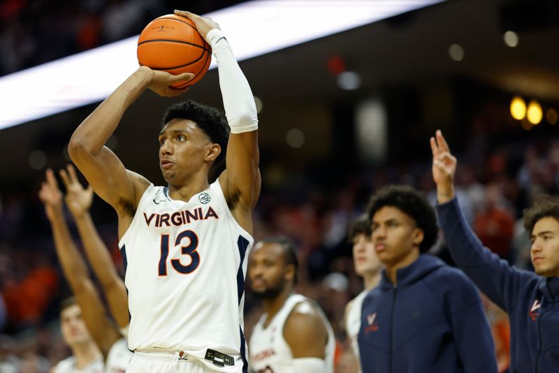 Nov 29, 2023; Charlottesville, Virginia, USA; Virginia Cavaliers guard Ryan Dunn (13) shoots the ball against the Texas A&M Aggies in the second half at John Paul Jones Arena. Mandatory Credit: Geoff Burke-USA TODAY Sports