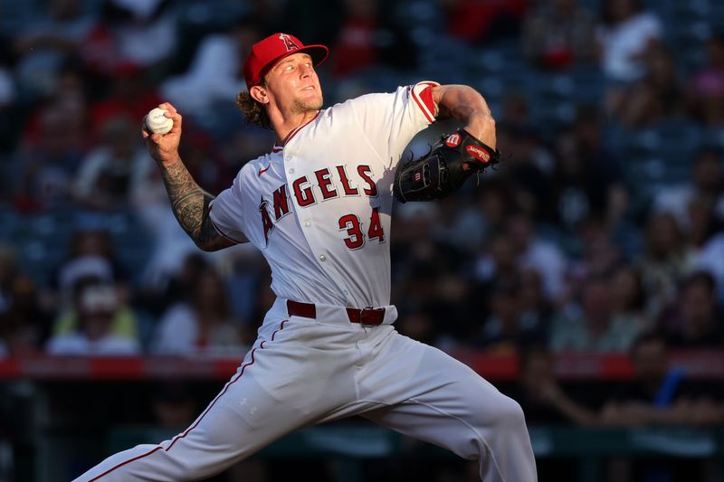 Jun 28, 2024; Anaheim, California, USA;  Los Angeles Angels starting pitcher Zach Plesac (34) pitches during the third inning against the Detroit Tigers at Angel Stadium. Mandatory Credit: Kiyoshi Mio-USA TODAY Sports