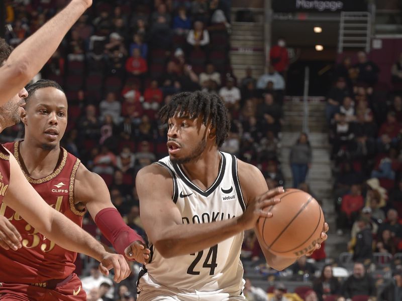 CLEVELAND, OH - MARCH 10: Cam Thomas #24 of the Brooklyn Nets handles the ball during the game against the Cleveland Cavaliers on March 10, 2024 at Rocket Mortgage FieldHouse in Cleveland, Ohio. NOTE TO USER: User expressly acknowledges and agrees that, by downloading and/or using this Photograph, user is consenting to the terms and conditions of the Getty Images License Agreement. Mandatory Copyright Notice: Copyright 2024 NBAE (Photo by David Liam Kyle/NBAE via Getty Images)