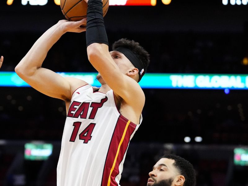 MIAMI, FLORIDA - JANUARY 08: Tyler Herro #14 of the Miami Heat shoots against the Houston Rockets during the first half at Kaseya Center on January 08, 2024 in Miami, Florida. NOTE TO USER: User expressly acknowledges and agrees that, by downloading and or using this photograph, User is consenting to the terms and conditions of the Getty Images License Agreement. (Photo by Rich Storry/Getty Images)