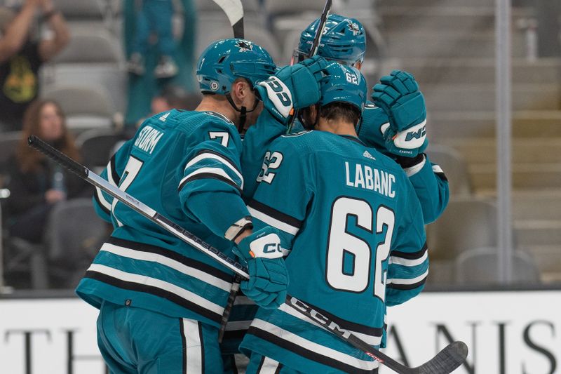 Sep 26, 2023; San Jose, California, USA; San Jose Sharks right wing Kevin Labanc (62) celebrates with the team during the second period against the Anaheim Ducks at SAP Center at San Jose. Mandatory Credit: Stan Szeto-USA TODAY Sports