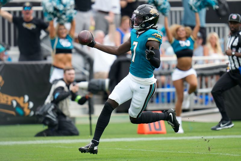 Jacksonville Jaguars wide receiver Brian Thomas Jr. reacts after a touchdown catch during the first half of an NFL football game against the Indianapolis Colts, Sunday, Oct. 6, 2024, in Jacksonville, Fla. (AP Photo/John Raoux)