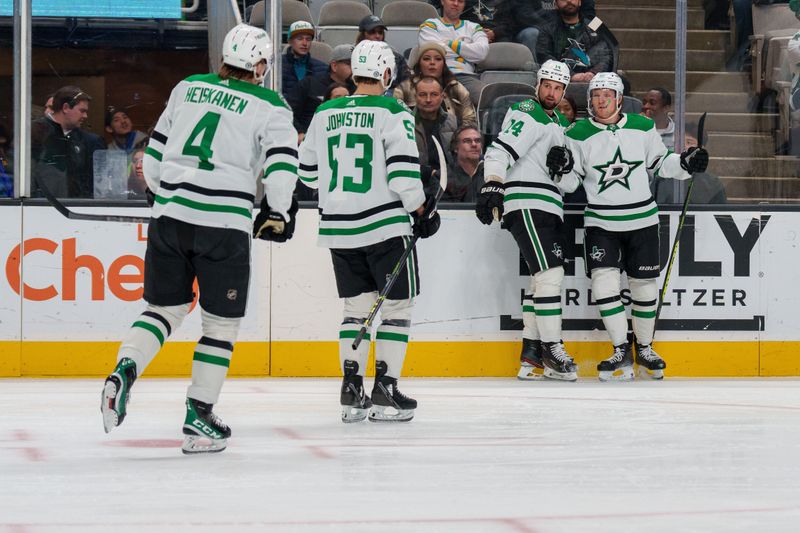 Jan 18, 2023; San Jose, California, USA; Dallas Stars center Ty Dellandrea (10) and left wing Jamie Benn (14) and center Wyatt Johnston (53) and defenseman Miro Heiskanen (4) celebrate after the goal during the first period against the San Jose Sharks at SAP Center at San Jose. Mandatory Credit: Neville E. Guard-USA TODAY Sports