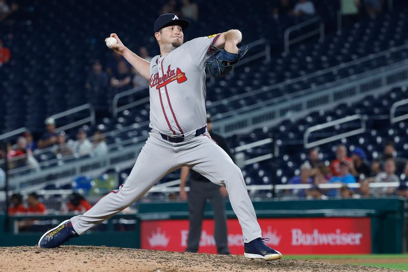 Sep 10, 2024; Washington, District of Columbia, USA; Atlanta Braves pitcher Luke Jackson (22) pitches against the Washington Nationals during the ninth inning at Nationals Park. Mandatory Credit: Geoff Burke-Imagn Images