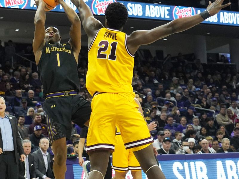 Jan 28, 2023; Evanston, Illinois, USA; Northwestern Wildcats guard Chase Audige (1) shoots the ball over Minnesota Golden Gophers forward Pharrel Payne (21) during the second half at Welsh-Ryan Arena. Mandatory Credit: David Banks-USA TODAY Sports