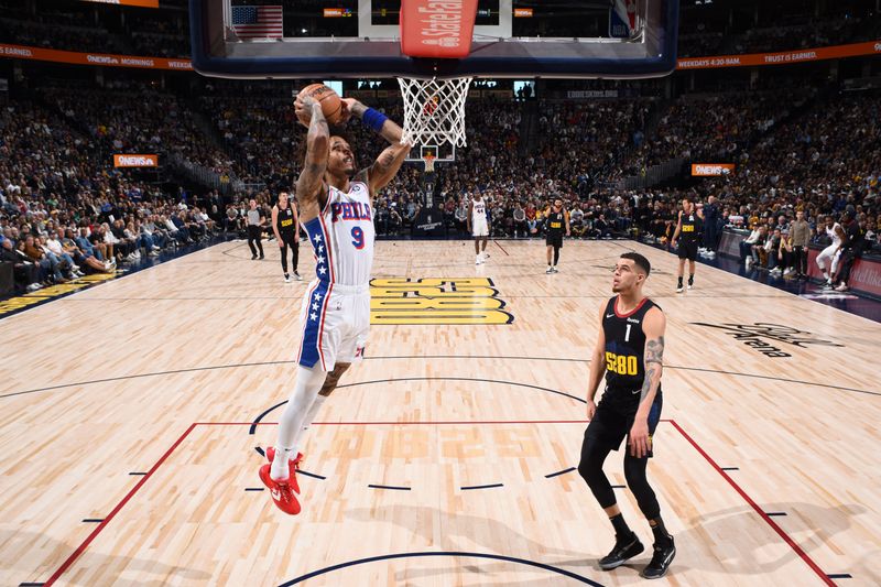 DENVER, CO - JANUARY 27: Kelly Oubre Jr. #9 of the Philadelphia 76ers drives to the basket during the game against the Denver Nuggets on January 27, 2024 at the Ball Arena in Denver, Colorado. NOTE TO USER: User expressly acknowledges and agrees that, by downloading and/or using this Photograph, user is consenting to the terms and conditions of the Getty Images License Agreement. Mandatory Copyright Notice: Copyright 2024 NBAE (Photo by Garrett Ellwood/NBAE via Getty Images)