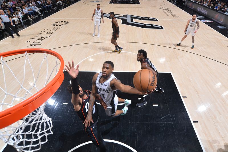 SAN ANTONIO, TX - APRIL 14: Blake Wesley #14 of the San Antonio Spurs drives to the basket during the game  against the Detroit Pistons on April 14, 2024 at the Frost Bank Center in San Antonio, Texas. NOTE TO USER: User expressly acknowledges and agrees that, by downloading and or using this photograph, user is consenting to the terms and conditions of the Getty Images License Agreement. Mandatory Copyright Notice: Copyright 2024 NBAE (Photos by Michael Gonzales/NBAE via Getty Images)