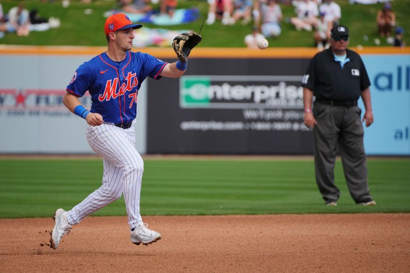 Mar 3, 2024; Port St. Lucie, Florida, USA; New York Mets shortstop Zack Short (74) fields a ground ball in the fourth inning against the Houston Astros at Clover Park. Mandatory Credit: Jim Rassol-USA TODAY Sports