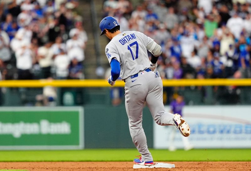 Jun 24, 2025; Denver, Colorado, USA; Los Angeles Dodgers two-way player Shohei Ohtani (17) runs off a two run home run in the sixth inning against the Colorado Rockies at Coors Field. Mandatory Credit: Ron Chenoy-Imagn Images
