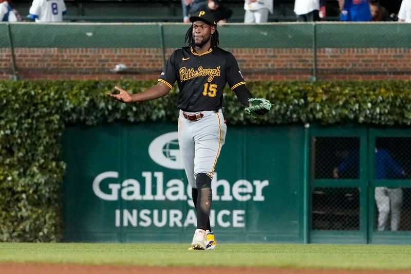 Sep 3, 2024; Chicago, Illinois, USA; Pittsburgh Pirates outfielder Oneil Cruz (15) celebrates a win against the Chicago Cubs at Wrigley Field. Mandatory Credit: David Banks-Imagn Images