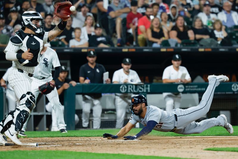 Aug 23, 2024; Chicago, Illinois, USA; Detroit Tigers outfielder Riley Greene (31) scores against the Chicago White Sox during the seventh inning at Guaranteed Rate Field. Mandatory Credit: Kamil Krzaczynski-USA TODAY Sports