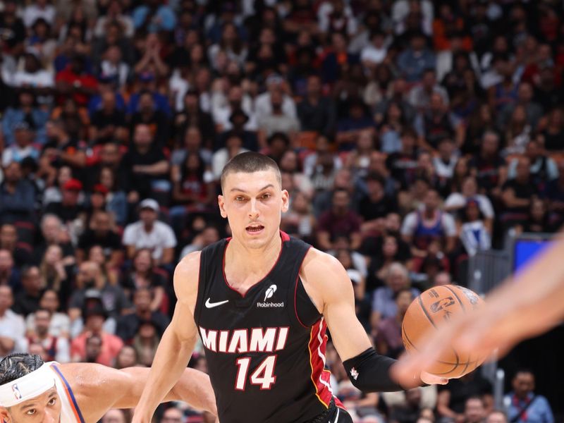 MIAMI, FL - OCTOBER 30: Tyler Herro #14 of the Miami Heat dribbles the ball during the game against the New York Knicks on October 30, 2024 at Kaseya Center in Miami, Florida. NOTE TO USER: User expressly acknowledges and agrees that, by downloading and or using this Photograph, user is consenting to the terms and conditions of the Getty Images License Agreement. Mandatory Copyright Notice: Copyright 2024 NBAE (Photo by Jeff Haynes/NBAE via Getty Images)