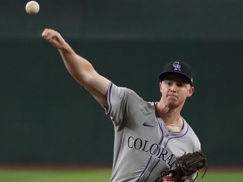 Aug 14, 2024; Phoenix, Arizona, USA; Colorado Rockies pitcher Tanner Gordon (29) throws against the Arizona Diamondbacks in the first inning at Chase Field. Mandatory Credit: Rick Scuteri-USA TODAY Sports