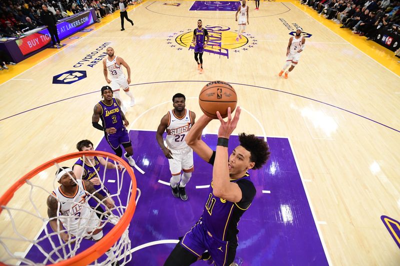 LOS ANGELES, CA - JANUARY 11: Jaxson Hayes #11 Of the Los Angeles Lakers drives to the basket during the game against the Phoenix Suns on January 11, 2024 at Crypto.Com Arena in Los Angeles, California. NOTE TO USER: User expressly acknowledges and agrees that, by downloading and/or using this Photograph, user is consenting to the terms and conditions of the Getty Images License Agreement. Mandatory Copyright Notice: Copyright 2024 NBAE (Photo by Adam Pantozzi/NBAE via Getty Images)