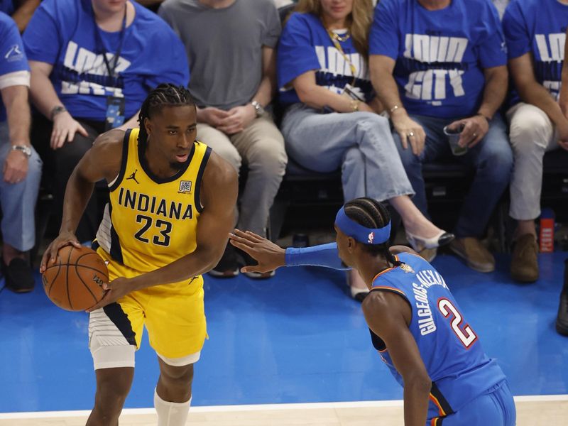 OKLAHOMA CITY, OK - JUNE 8: Aaron Nesmith #23 of the Indiana Pacers handles the ball during the game against the Oklahoma City Thunder during Game Two of the 2025 NBA Finals on June 8, 2025 at Paycom Center in Oklahoma City, Oklahoma. NOTE TO USER: User expressly acknowledges and agrees that, by downloading and or using this photograph, User is consenting to the terms and conditions of the Getty Images License Agreement. Mandatory Copyright Notice: Copyright 2025 NBAE (Photo by Logan Riely /NBAE via Getty Images)