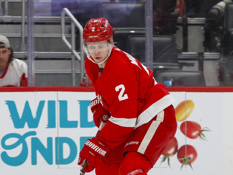 Dec 9, 2023; Detroit, Michigan, USA; Detroit Red Wings defenseman Olli Maatta (2) handles the puck during the first period at Little Caesars Arena. Mandatory Credit: Brian Bradshaw Sevald-USA TODAY Sports