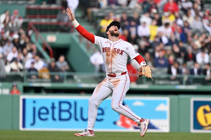 Apr 10, 2025; Boston, Massachusetts, USA; Boston Red Sox shortstop Trevor Story (10) calls out for the catch during the fifth inning against the Toronto Blue Jays at Fenway Park. Mandatory Credit: Eric Canha-Imagn Images