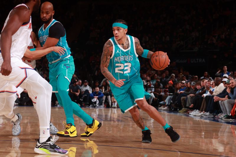 NEW YORK, NY - OCTOBER 15: Tre Mann #23 of the Charlotte Hornets drives to the basket during the game against the New York Knicks during the 2024 NBA Preseason on October 15, 2024 at Madison Square Garden in New York City, New York.  NOTE TO USER: User expressly acknowledges and agrees that, by downloading and or using this photograph, User is consenting to the terms and conditions of the Getty Images License Agreement. Mandatory Copyright Notice: Copyright 2024 NBAE  (Photo by Nathaniel S. Butler/NBAE via Getty Images)