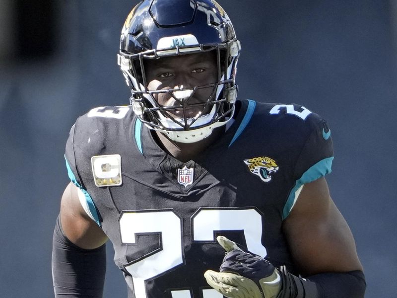 Jacksonville Jaguars linebacker Foyesade Oluokun (23) runs on the field during player introductions before an NFL football game against the Tennessee Titans, Sunday, Nov. 19, 2023, in Jacksonville, Fla. (AP Photo/John Raoux)