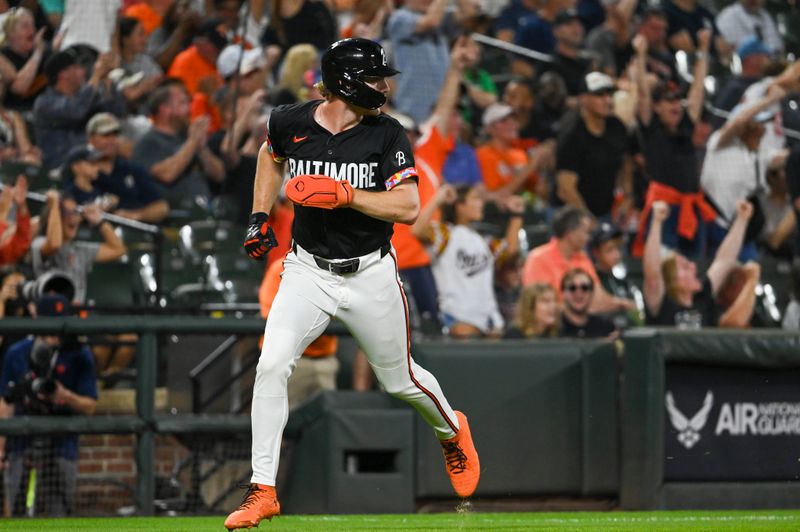 Sep 20, 2024; Baltimore, Maryland, USA; Baltimore Orioles shortstop Gunnar Henderson (2) runs home on outfielder Anthony Santander (not pictured) first inning home run against the Detroit Tigers at Oriole Park at Camden Yards. Mandatory Credit: Tommy Gilligan-Imagn Images