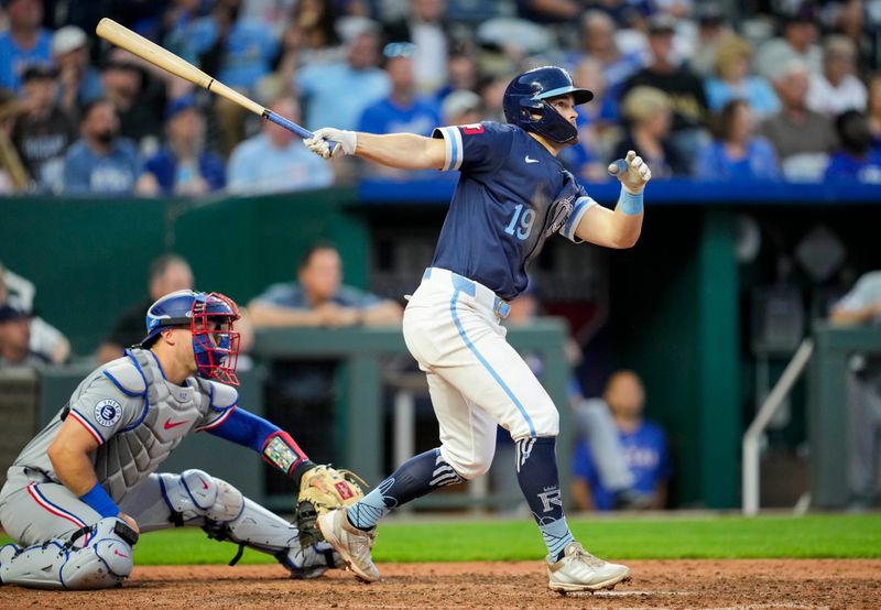 May 3, 2024; Kansas City, Missouri, USA; Kansas City Royals second base Michael Massey (19) hits a double during the sixth inning against the Texas Rangers at Kauffman Stadium. Mandatory Credit: Jay Biggerstaff-USA TODAY Sports