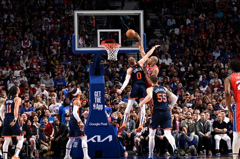 PHILADELPHIA, PA - APRIL 28: Nicolas Batum #40 of the Philadelphia 76ers dunks the ball during the game against the New York Knicks during Round 1 Game 4 of the 2024 NBA Playoffs on April 28, 2024 at the Wells Fargo Center in Philadelphia, Pennsylvania NOTE TO USER: User expressly acknowledges and agrees that, by downloading and/or using this Photograph, user is consenting to the terms and conditions of the Getty Images License Agreement. Mandatory Copyright Notice: Copyright 2024 NBAE (Photo by David Dow/NBAE via Getty Images)