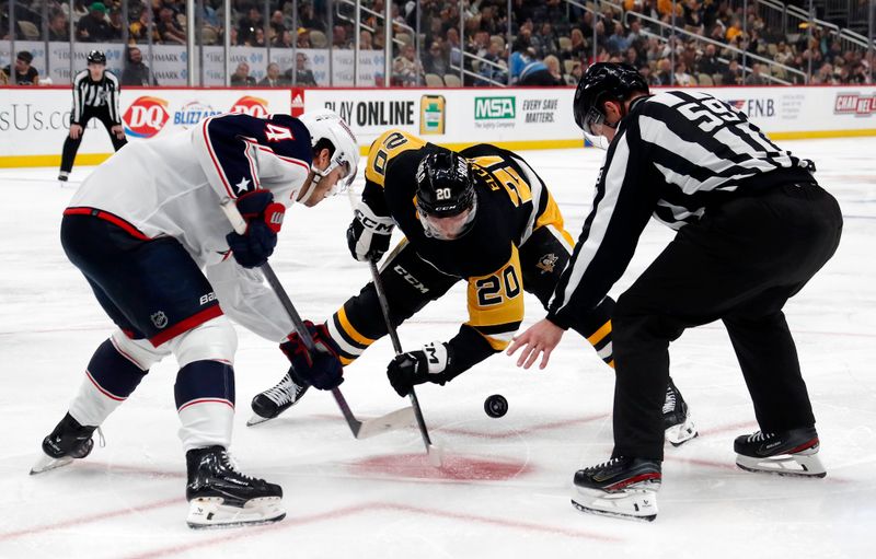 Mar 5, 2024; Pittsburgh, Pennsylvania, USA; Columbus Blue Jackets center Cole Sillinger (4) and Pittsburgh Penguins center Lars Eller (20) take a face-off during the third period at PPG Paints Arena. The Penguins won 5-3. Mandatory Credit: Charles LeClaire-USA TODAY Sports