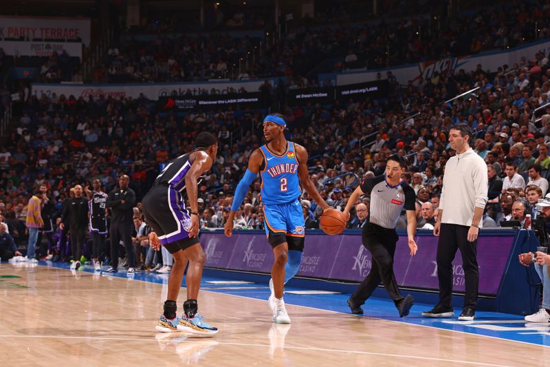 OKLAHOMA CITY, OK - APRIL 9:  Shai Gilgeous-Alexander #2 of the Oklahoma City Thunder dribbles the ball during the game against the Sacramento Kings on April 9, 2024 at Paycom Arena in Oklahoma City, Oklahoma. NOTE TO USER: User expressly acknowledges and agrees that, by downloading and or using this photograph, User is consenting to the terms and conditions of the Getty Images License Agreement. Mandatory Copyright Notice: Copyright 2024 NBAE (Photo by Zach Beeker/NBAE via Getty Images)