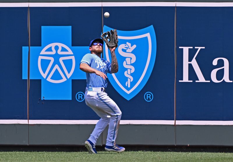 Jul 2, 2023; Kansas City, Missouri, USA;  Kansas City Royals center fielder Kyle Isbel (28) catches a fly ball in the fourth inning against the Los Angeles Dodgers at Kauffman Stadium. Mandatory Credit: Peter Aiken-USA TODAY Sports